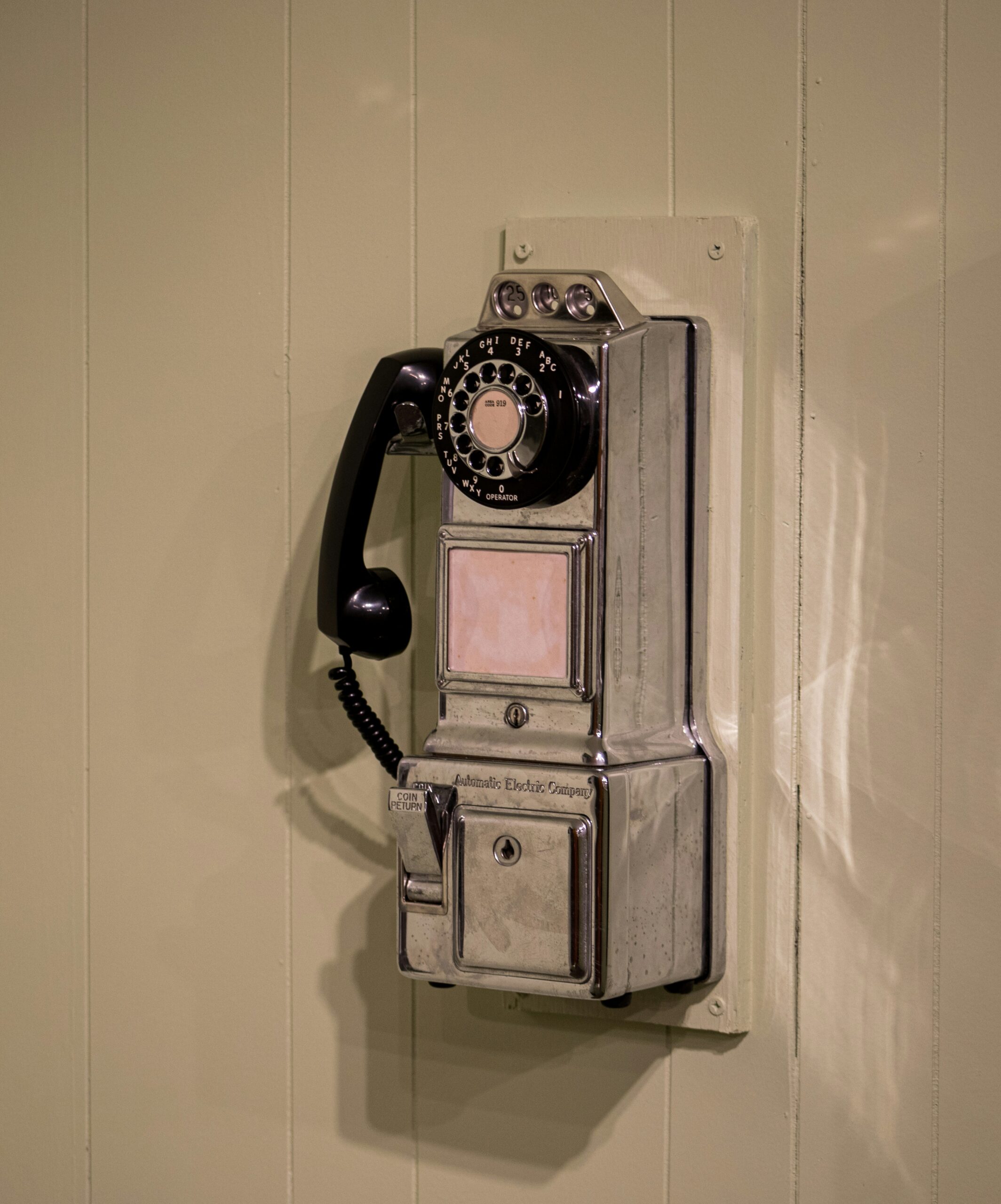 A Black And Silver Telephone